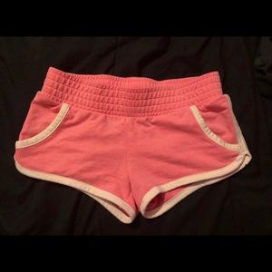 Pink booty shorts with white lining
